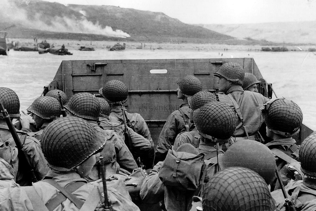 American troops in an LCVP landing craft approaching Omaha Beach as part of the invasion of Normandy, France, on “D-Day” during World War II, June 6, 1944. Credit: Photo from the Army Signal Corps Collection in the U.S. National Archives.