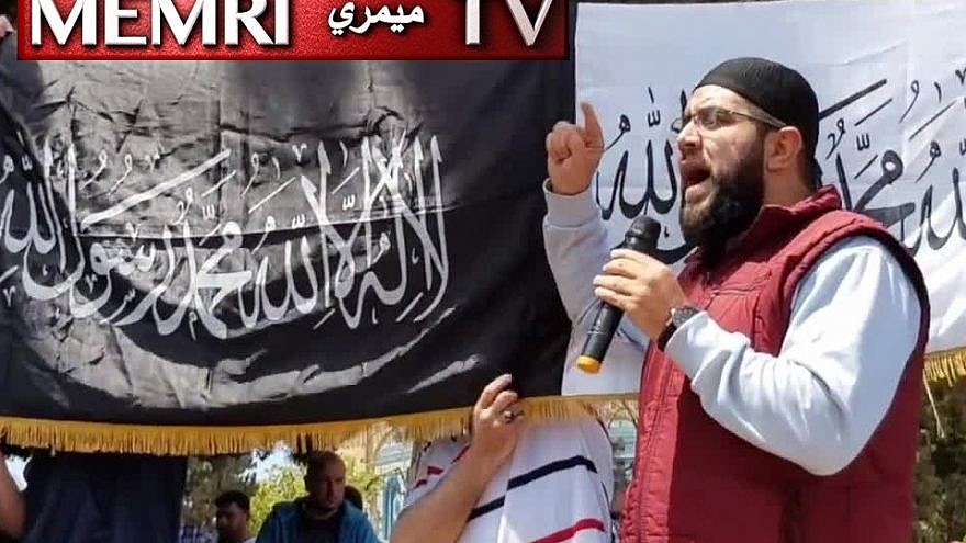 In this still image taken from a video posted on May 10, 2019, Palestinian cleric Nidhal Siam is seen addressing a crowd outside the Al-Aqsa mosque in Jerusalem. (MEMRI)