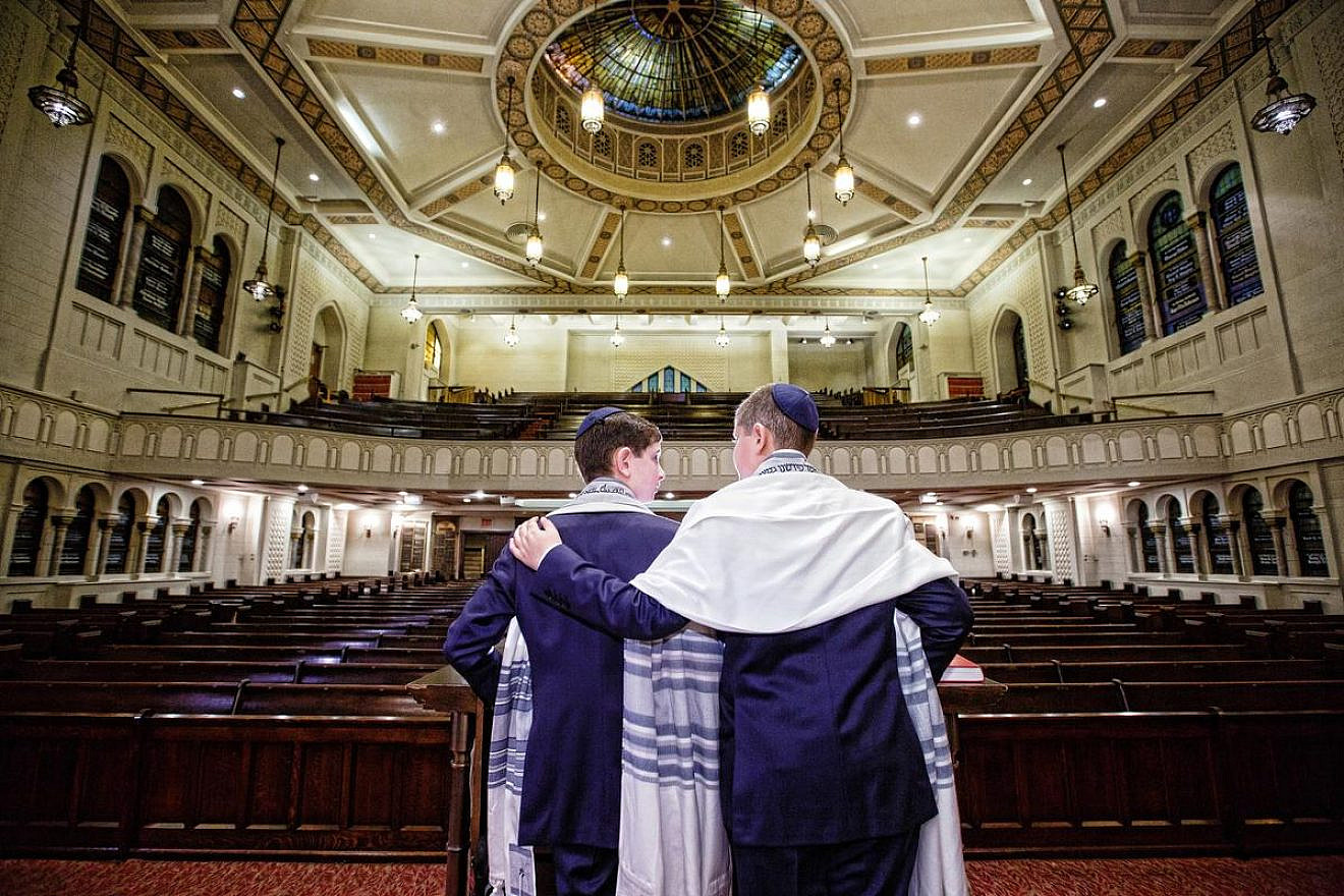 Brian (left) and Benjamin Barth in Park Avenue Synagogue in New York City. Photo by Michael Jurick.