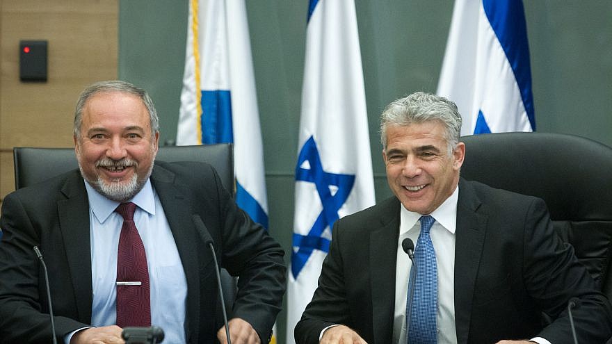 Yair Lapid and Avigdor Lieberman lead a joint conference in the Israeli parliament regarding Israel's foreign policy, Feb. 29, 2016. Photo by Miriam Alster/Flash90