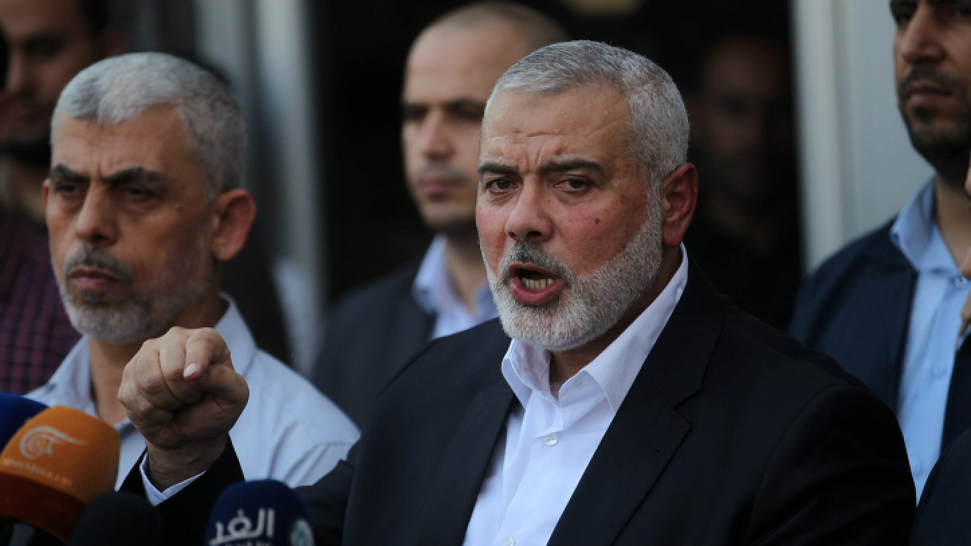 Hamas chief Ismail Haniyeh (right) and leader in Gaza Yahya Sinwar speak to the press in the southern Strip, Sept. 19, 2017. Photo by Abed Rahim Khatib/Flash90.