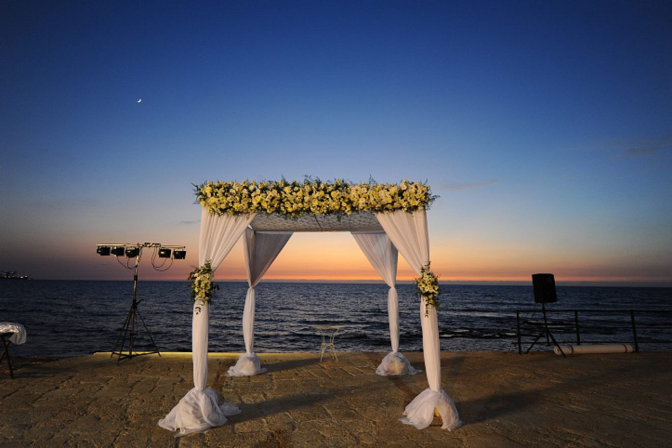 Illustrative photo of a Jewish wedding canopy in front of the Mediterranean Sea, Jan. 11, 2018. Photo by Mendy Hechtman/Flash90.