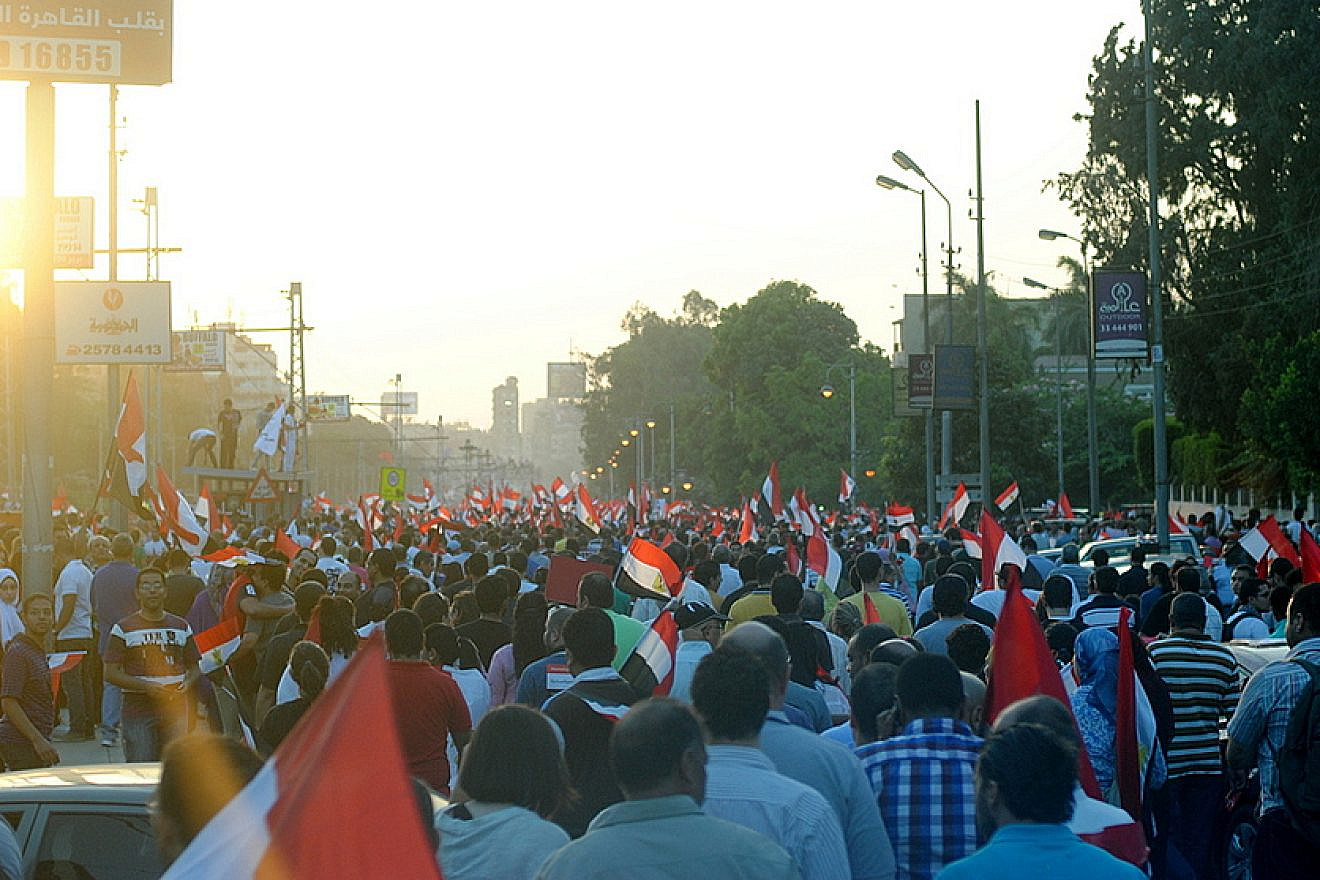 A protest march in Cairo against Egyptian President Mohamed Morsi, June 28 2013. Credit: Lilian Wagdy via Wikimedia Commons.