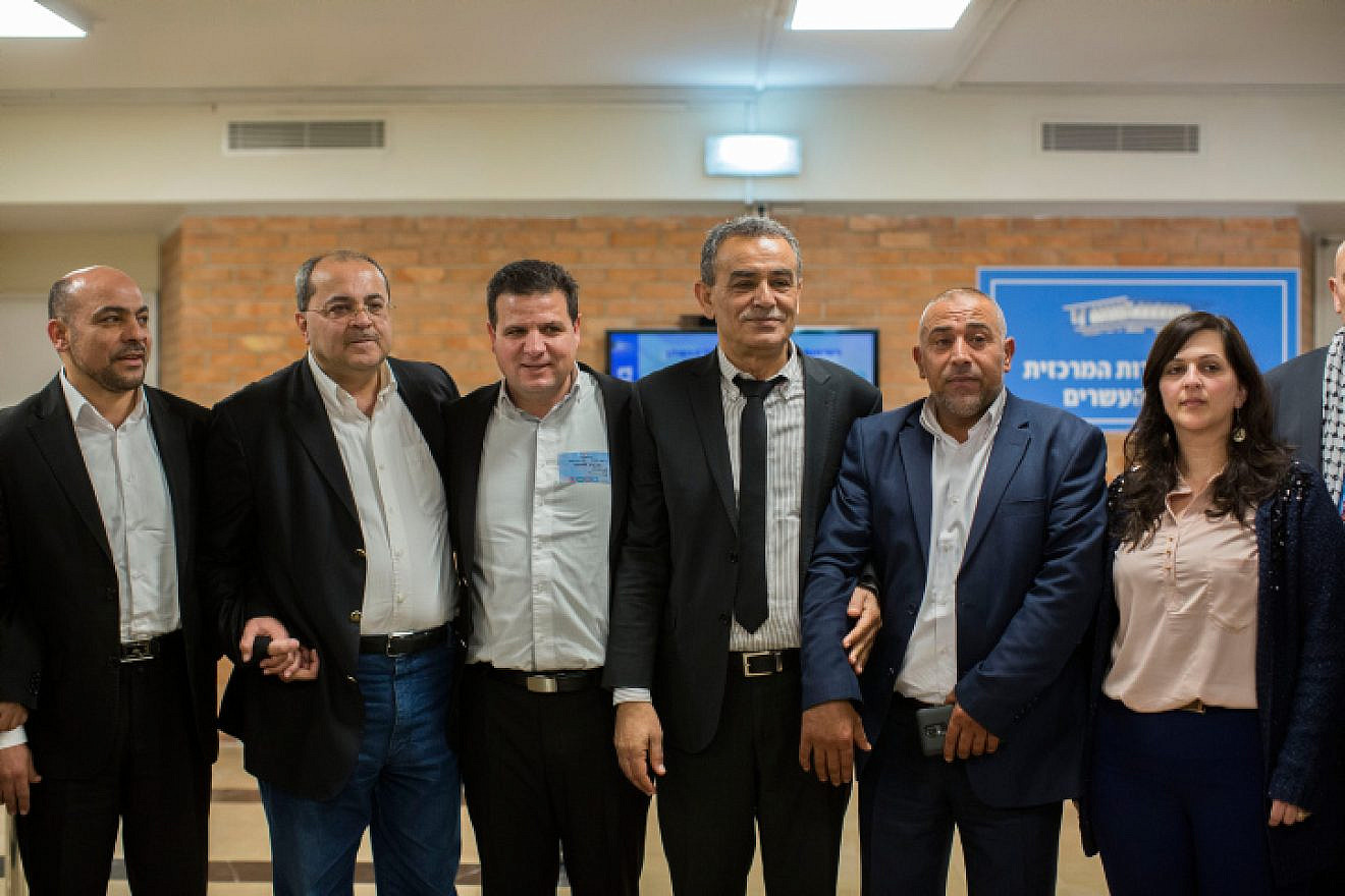 Joint Arab List members pose for a picture outside a committee meeting prior to Israel's March 2015 general election, on January 28, 2015. Photo by Yonatan Sindel/Flash90.