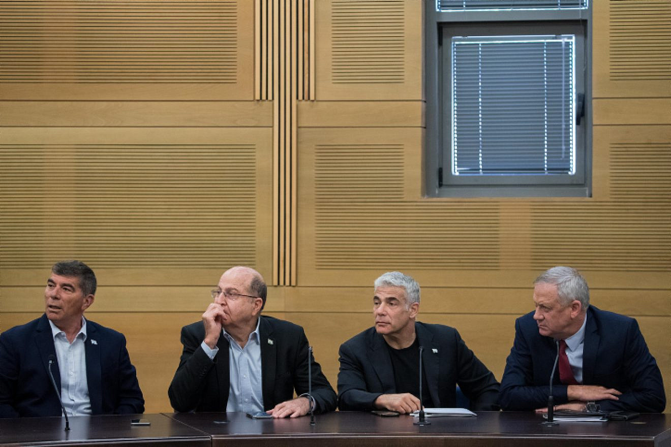 From right to left: Blue and White Party leaders Benny Gantz, Yair Lapid, Moshe Ya'alon and Gabi Ashkenazi at a faction meeting at the Knesset, on June 24, 2019. Photo by Yonatan Sindel/Flash90.