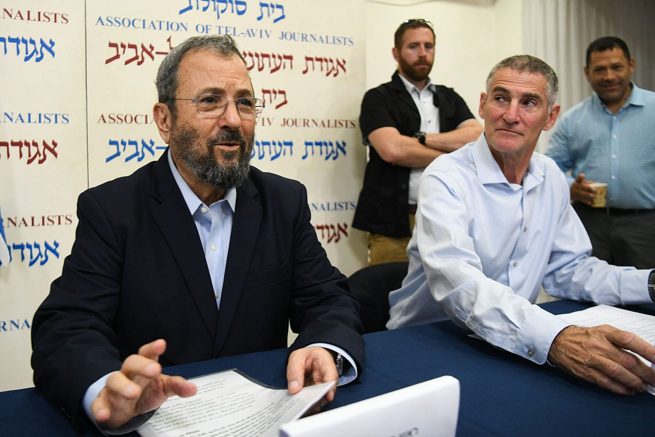 Former Israel Prime Minister Ehud Barak (left) and IDF Maj. Gen. (ret.) Yair Golan attend a press conference announcing the establishment of a new political party led by Barak in Tel Aviv on June 26, 2019. Photo by Flash90.