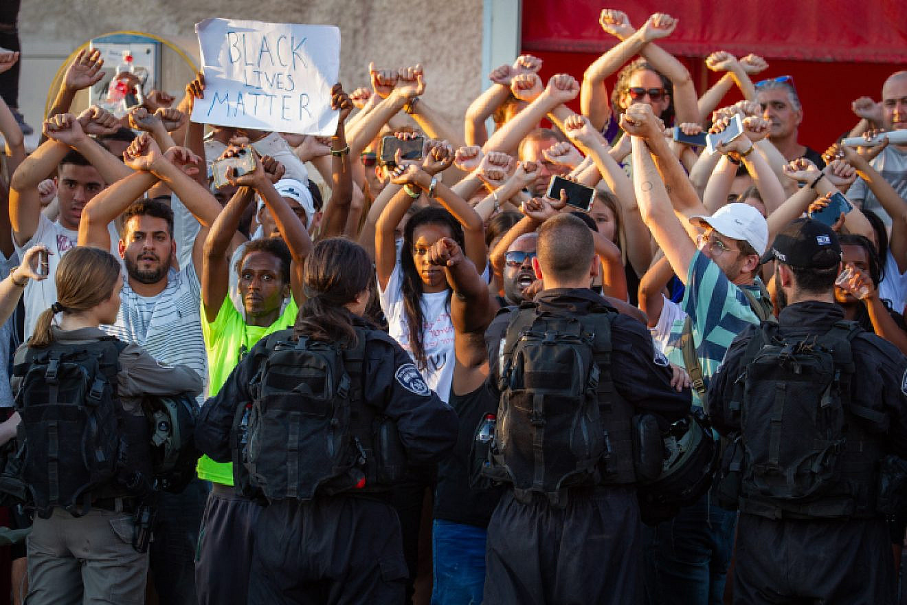 Ethiopian Israelis and supporters take part in a protest against police violence and discrimination following the death of 19-year-old Solomon Tekah, in Kiryat Ata on July 3, 2019. Photo by Flash90.