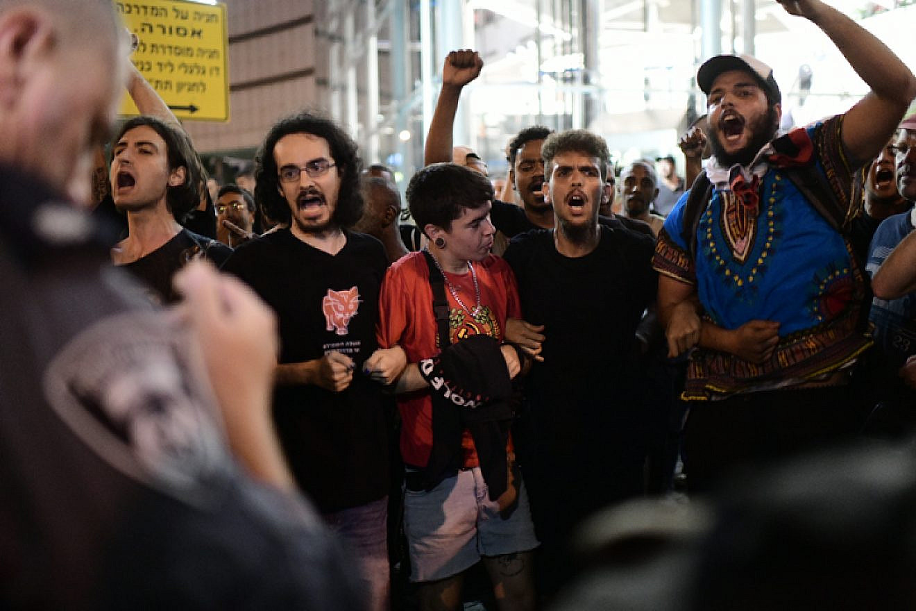 Ethiopian Israelis and supporters take part in a protest in Tel Aviv against the use of police violence after the shooting of Ethiopian teenager Solomon Tekah on July 3, 2019. Photo by Tomer Neuberg/Flash90.