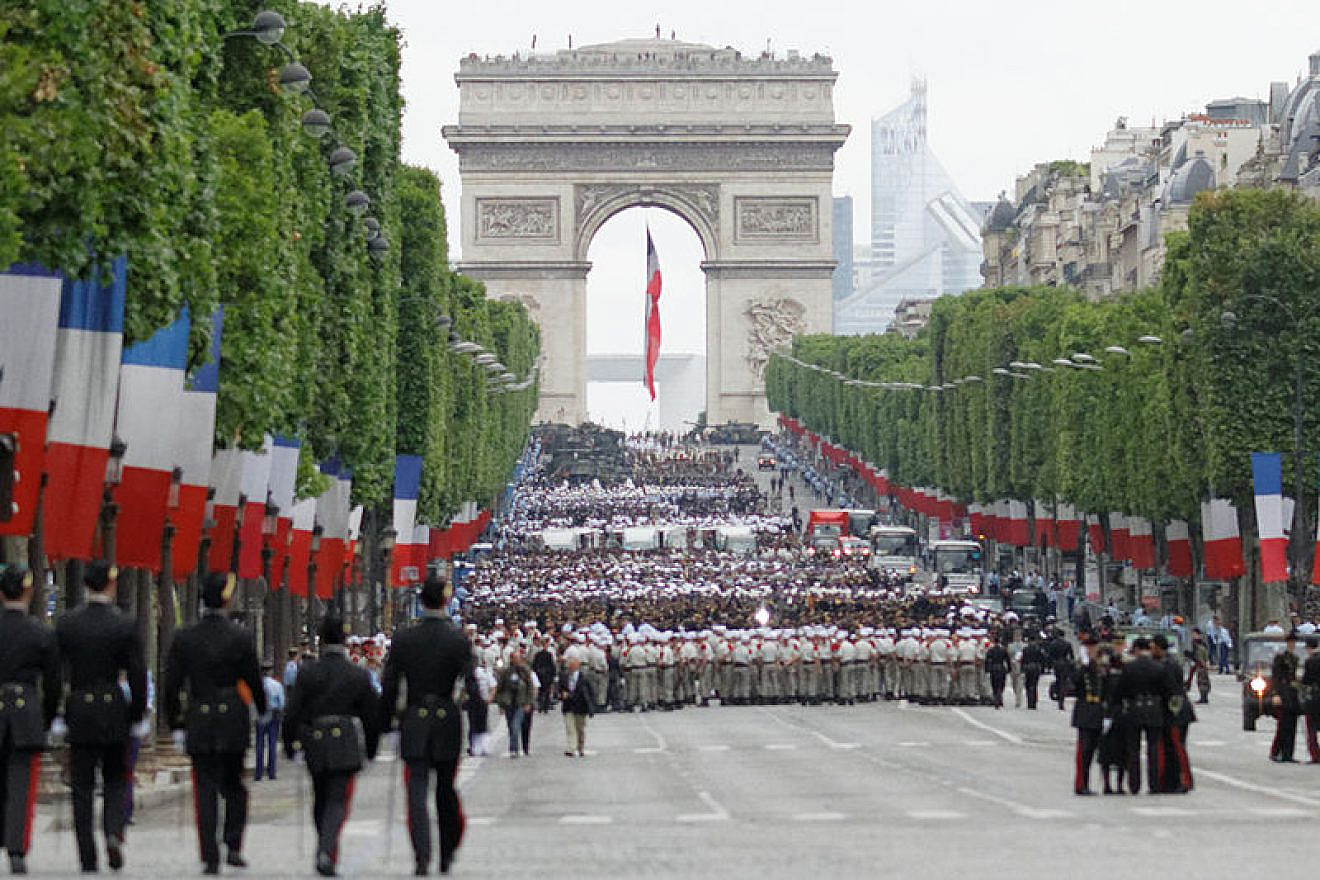 A military parade on the Champs-Élysées in Paris on Bastille Day, July 14, 2014. Photo: Pierre-Yves Beaudouin via Wikimedia Commons.