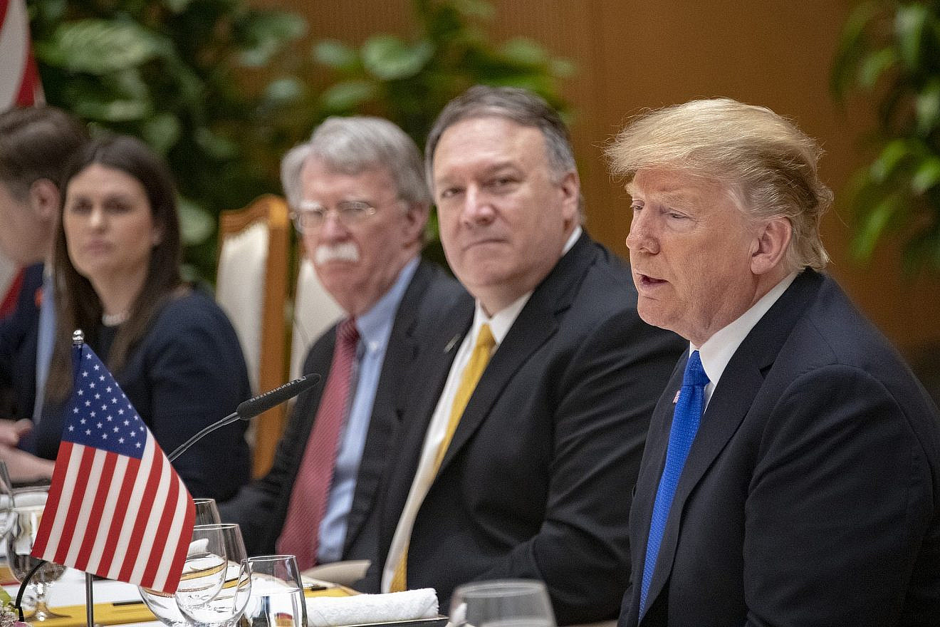 U.S. President Donald Trump (far right) speaks alongside Secretary of State Mike Pompeo and National Security Advisor John Bolton. Credit: State Department via Flickr.