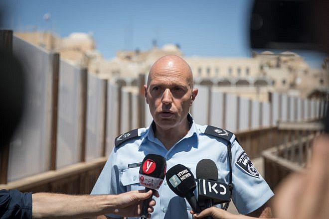 Jerusalem District Police Commander Doron Yedid speaks with media at the Mughrabi Bridge in the Old City of Jerusalem after clashes broke out on the Temple Mount, on Aug. 11, 2019. Photo by Hadas Parush/Flash90.