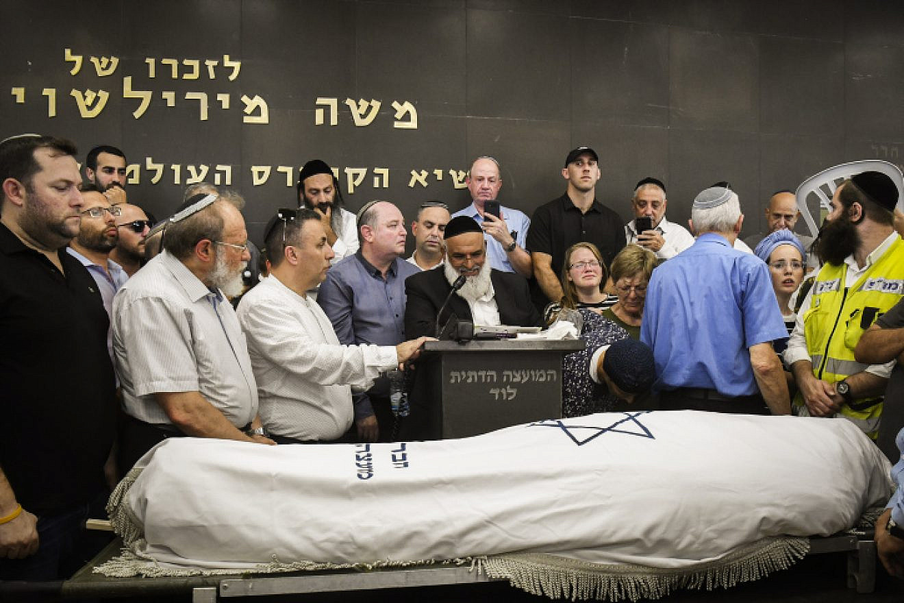 Family and friends attend the funeral of Rina Shnerb, 17, in Lod, Israel, on Aug. 23, 2019.