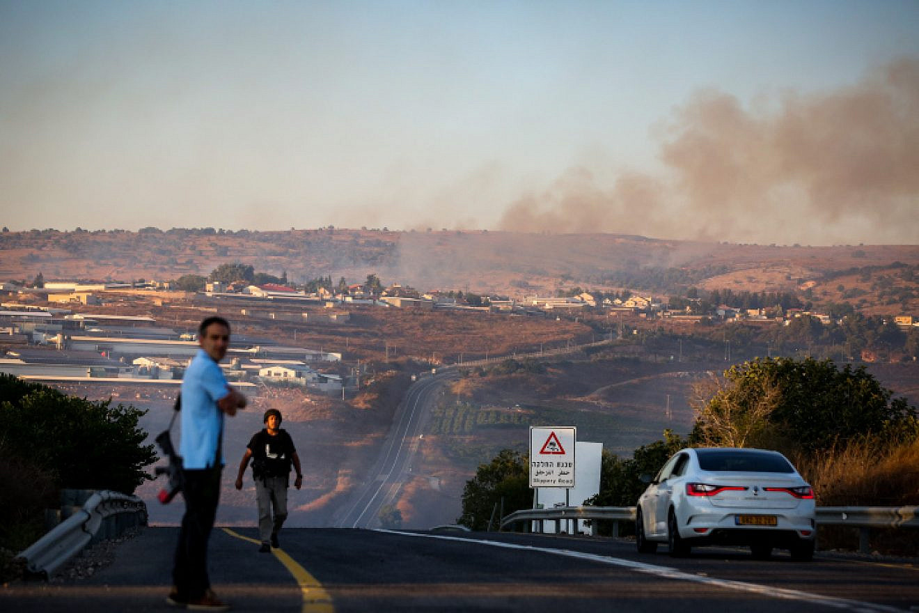 Smoke rises from a fire caused from a rocket fired from Lebanon near Moshav Avivim on the border with Lebanon, in northern Israel, Sept. 1, 2019. Photo by David Cohen/Flash90.