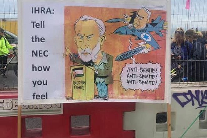 A poster outside of the British Labour Party conference alluding to Jeremy Corbyn. Credit: James Marlow.