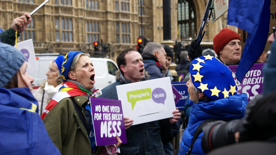 Flags and placards at the People's Vote March in  London on March 23, 2019. Credit: Andrew Gray via Wikimedia Commons.