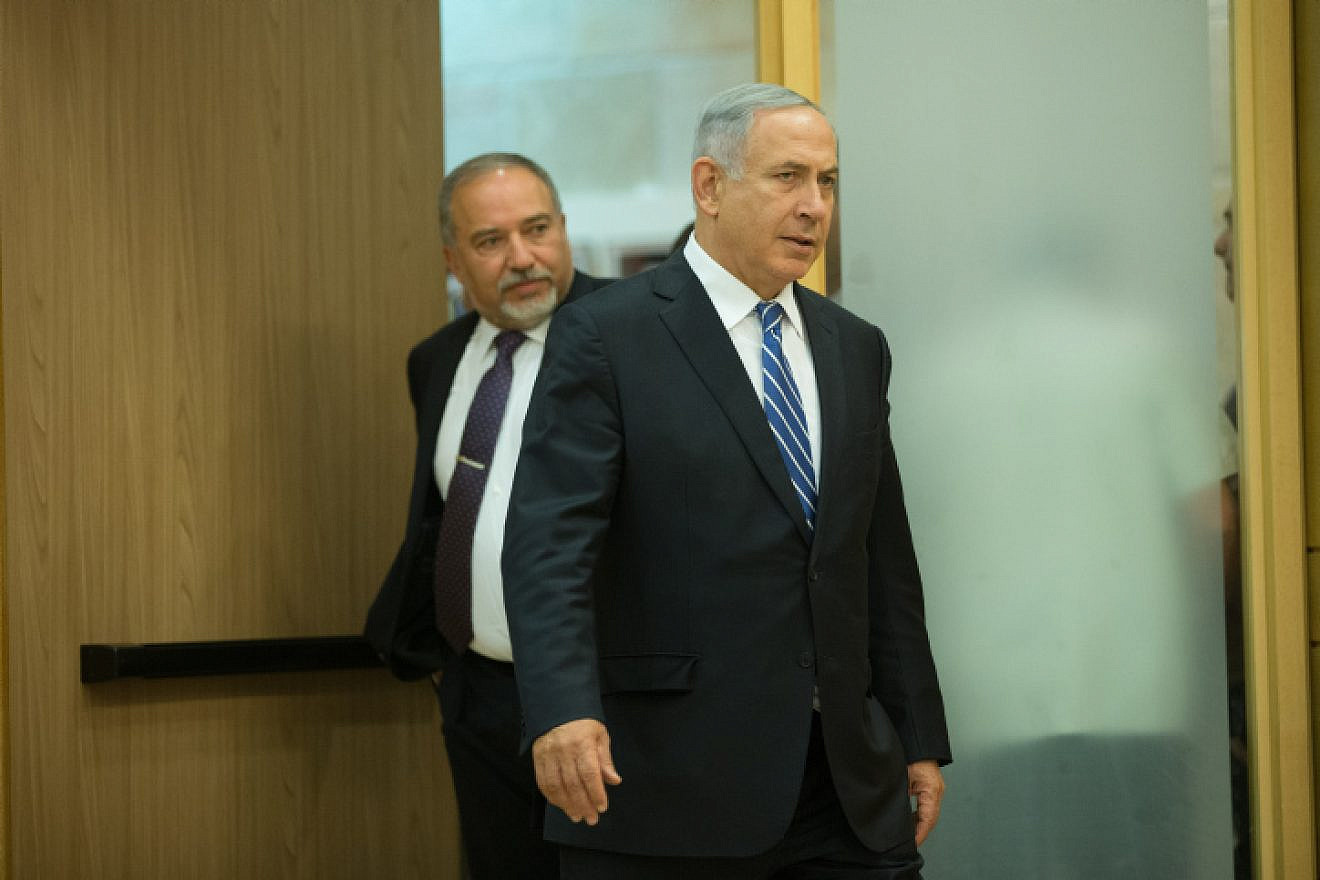 Israeli Prime Minister Benjamin Netanyahu and Defence Minister Avigdor Lieberman arrive at a joint press conference in the Knesset on May 30, 2016. Photo by Yonatan Sindel/Flash90.