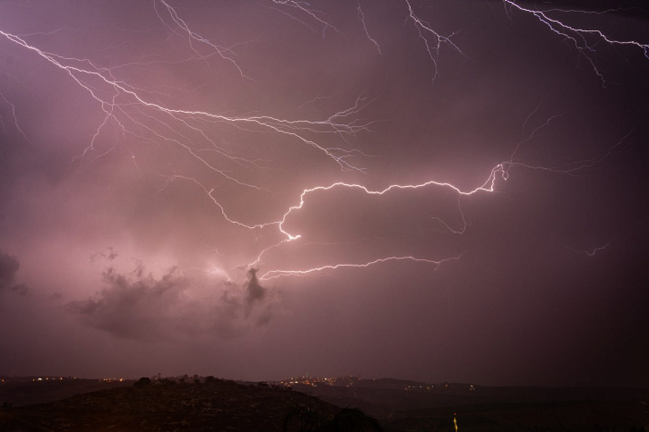Illustrative: Lightning illuminates the sky over the Shomron Mountains in the West Bank on Nov. 4, 2018. Photo by Hillel Maeir/Flash90.