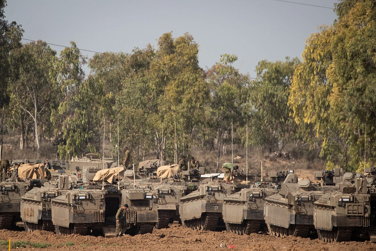 Israeli armored vehicles at a staging area in southern Israel near the border with the Gaza Strip on Nov. 13, 2019. Photo by Yonatan Sindel/Flash90.