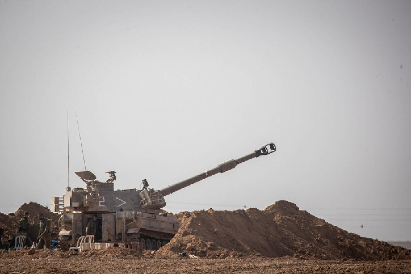 Israeli soldiers and artillery at a staging area in southern Israel, near the border with the Gaza Strip, on Nov. 13, 2019. Photo by Yonatan Sindel/Flash90.