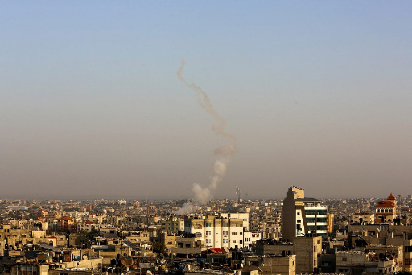Smoke rises after rockets are fired towards Israel from Rafah in the southern Gaza Strip on Nov. 13, 2019. Photo by Abed Rahim Khatib/Flash90.