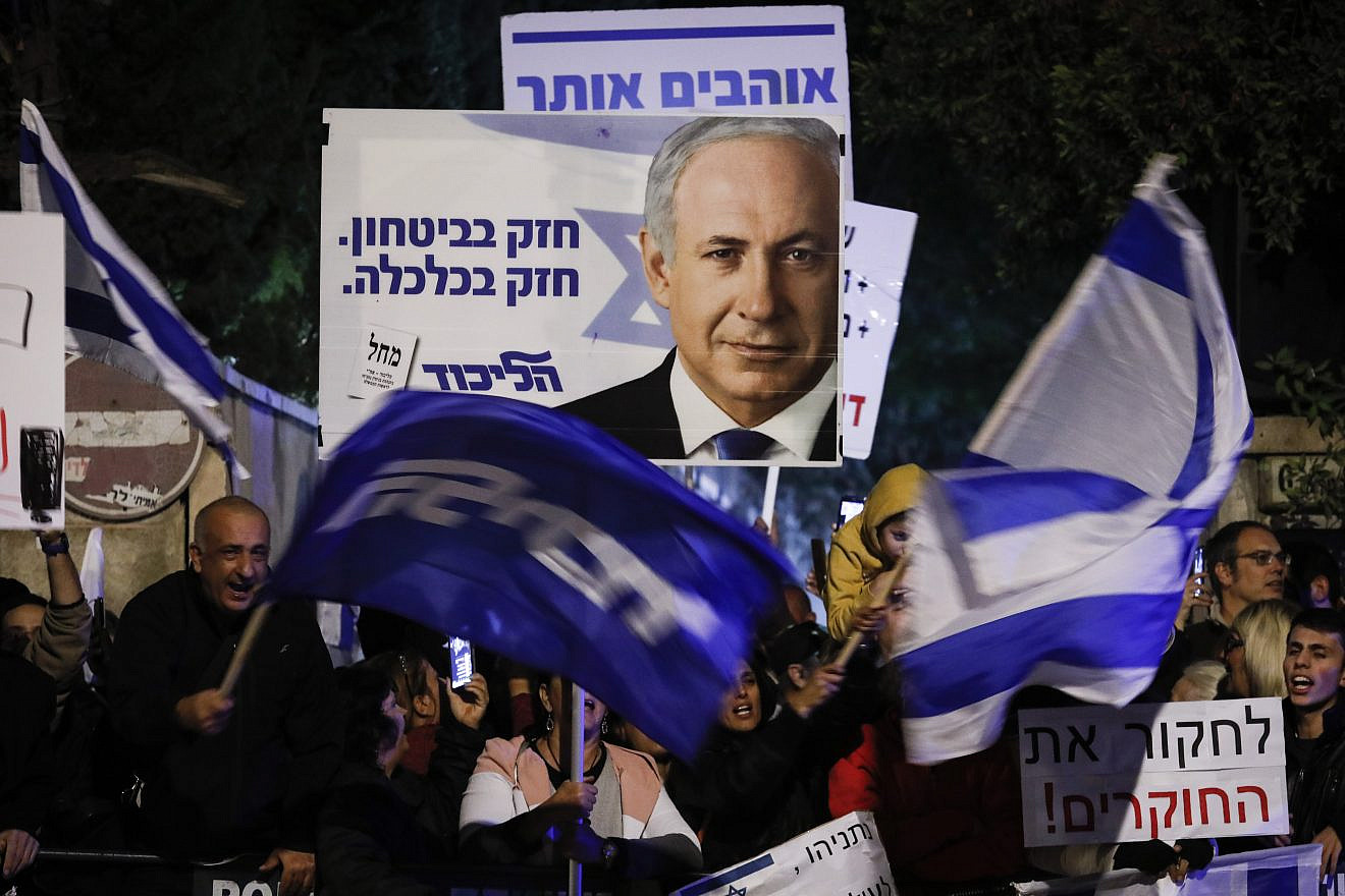 Supporters of Israeli Prime Minister Benjamin Netanyahu show their support outside the PM's residence in Jerusalem, November 23, 2019. Photo by Olivier Fitoussi/Flash90