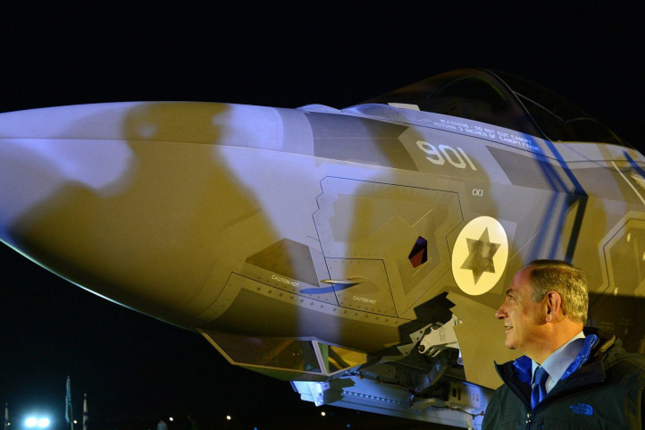 Israeli Prime Minister Benjamin Netanyahu at a ceremony for the new F-35 stealth fighter jet at the Nevatim Air Force Base in the Negev Desert. Dec. 12, 2016. Photo by Kobi Gideon/GPO.