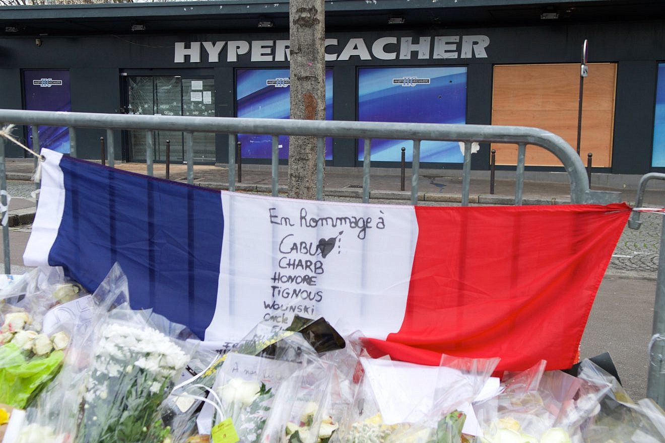 The French tri-colored flag outside the Hyper Cacher kosher market in Paris to pay homage to the four Jewish victims shot and killed inside the store a week earlier, Jan. 16, 2015. Credit: U.S. State Department Photo/Public Domain.