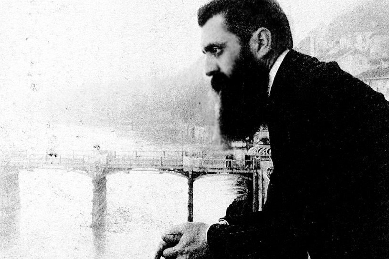 Theodor Herzl, considered the father of modern-day Zionism, leans over the balcony of the Hotel Les Trois Rois (Three King's Hotel/Hotel drei Könige) in Basel, Switzerland, possibly during the sixth Zionist conference there. Credit: The Bettman Archive.