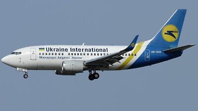 A Ukrainian National Airlines Boeing 737 landing in Italy on June 13, 2010. Photo: Aldo Bidini via Wikimedia Commons.