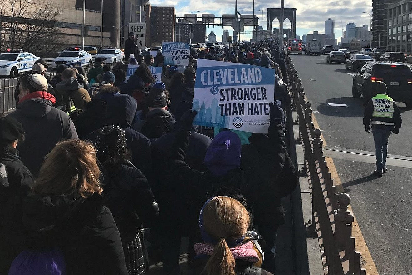 A group from Cleveland walks across the Brooklyn Bridge at the “No Hate. No Fear.” rally in New York City that drew 25,000 people, Jan. 5, 2020. Credit: Jewish Federation of Cleveland.