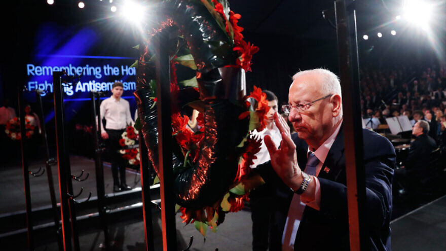 Israeli President Reuven Rivlin takes part in a wreath-laying ceremony at the Fifth World Holocaust Forum marking 75 years since the liberation of Auschwitz, at the Yad Vashem Holocaust memorial center in Jerusalem on Jan. 23, 2020. Photo by Ronen Zvulun/REUTERS/Pool.