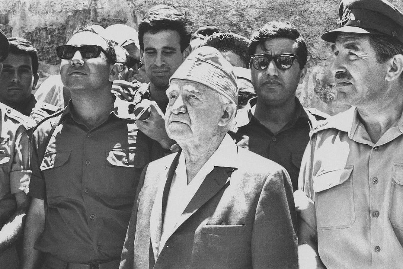 1967, Western Wall, Jerusalem, Israel. Two days after the city is reunified in the Six-Day War, Israeli Prime Minister David Ben-Gurion takes in the Western Wall with Maj. Gen. Chaim Herzog, at the time the first governor of Jerusalem, Judea and Samaria, and later Israel's sixth president. Photo: Meir Freundlich.