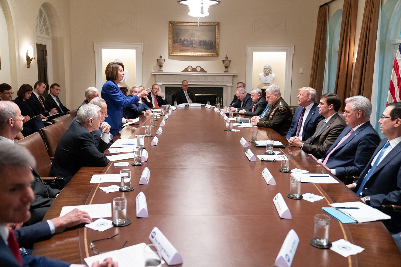 Speaker of the House Nancy Pelosi addresses U.S. President Donald Trump in the cabinet room at the White House in October 2019. Source: Wikimedia Commons.
