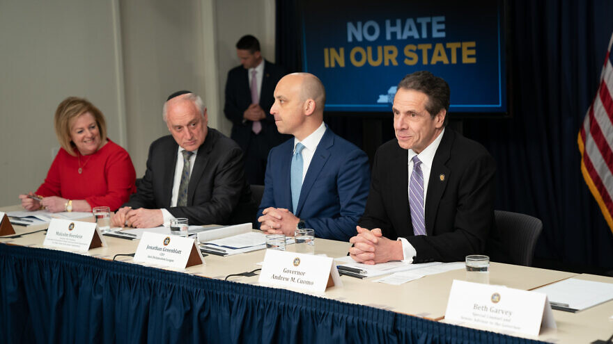 New York Gov. Andrew Cuomo (right) launches the “No Hate in Our State” campaign to combat crimes, divisiveness and anti-Semitism in New York State. Seated to his left is ADL national director and CEO Jonathan Greenblatt, Malcolm Hoenlein executive vice chairman of the Conference of Presidents of Major American Jewish Organizations, and Cheryl Fishbein, president of the Jewish Community Relations Council of New York. Credit: New York Governor's Office via Flickr.