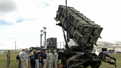 Members of the 74th Joint Civilian Orientation Conference view a Patriot missile air-defense battery on Kadena Air Base, Okinawa, Japan, on Nov. 9, 2007. Credit: U.S. Navy via Wikimedia Commons.