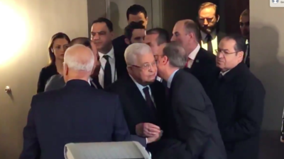 J Street president Jeremy Ben-Ami embraces Palestinian Authority leader Mahmoud Abbas following his statements at the Grand Hyatt Hotel in Midtown Manhattan on Feb. 11, 2020. Source: Screenshot.