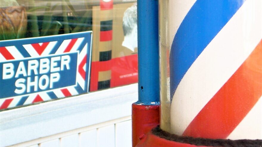 Antique red-and-blue striped barber shop pole in Pottstown, Pa. Credit: Willjay via Wikimedia Commons.