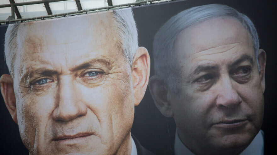 Blue and White Party election posters show leader Benny Gantz and Likud head Israeli Prime Minister Benjamin Netanyahu ahead of Israel's third round of elections within a year, Feb. 18, 2020. Photo by Miriam Alster/Flash90.
