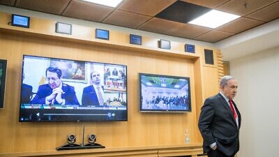 Israeli Prime Minister Benjamin Netanyahu participates in a video conference at the Foreign Ministry in Jerusalem with European leaders to discuss challenges and cooperation between countries in dealing with the coronavirus, March 9, 2020. Photo by Yonatan Sindel/Flash90.