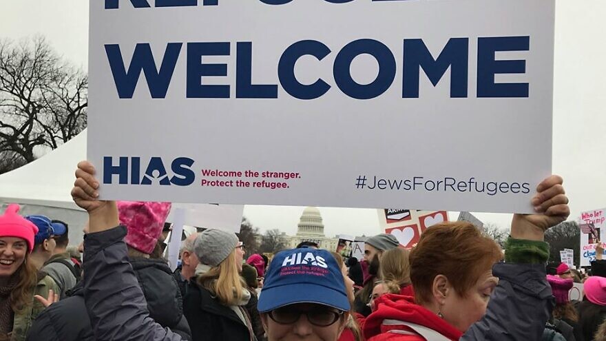 A HIAS supporter at a pro-immigration rally in 2020. Source: HIAS via Facebook.