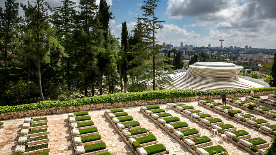 Due to the coronavirus pandemic, restrictions are in place for visits to The Mount Herzl Military Cemetery on  Yom Hazikaron, Israel's Memorial Day, on April 27, 2020. Photo by Olivier Fitoussi/Flash90.