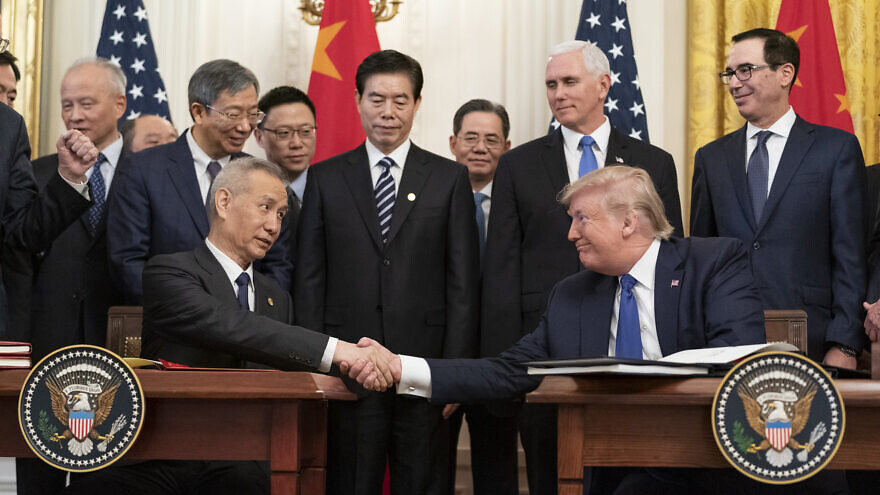 U.S. President Donald Trump, joined by Chinese Vice Premier Liu He, sign the U.S. China Phase One Trade Agreement in the East Room of the White House on Jan. 15, 2020. Official White House Photo by Shealah Craighead.