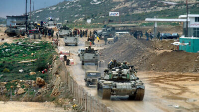Israel Defense Forces vehicles drive over the Awali bridge as they retreat from Lebanon on the first day of stage one of the planned retreat, Feb. 16 1985. Photo by Yossi Zamir/Flash90.