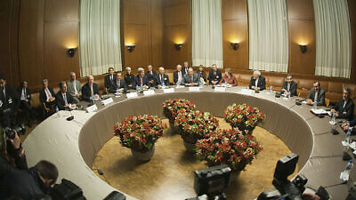 The foreign ministers of Germany, the United Kingdom, China, the United States, France, Russia, the European Union and Iran meet in Geneva on Nov. 24, 2013 for talks on the interim agreement on the Iranian nuclear program. Credit: U.S. Department of State.