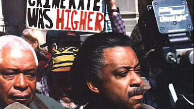 Rev. Al Sharpton outside of New York City Police Department Headquarters in 1999. Credit: Robert Swanson via Wikimedia Commons.