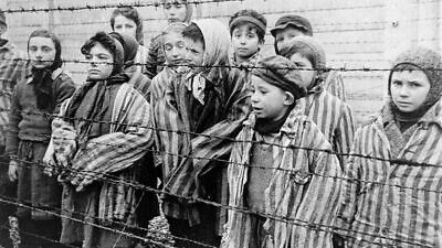 Jewish twins were kept alive to be used in Dr. Josef Mengele's medical experiments. These children from Auschwitz were liberated by the Red Army in January 1945. Credit: USHMM/Belarusian State Archive of Documentary Film and Photography.