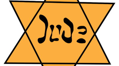 The yellow Star of David that the Nazis forced Jews to wear in the lead-up to and during the Holocaust. Credit: Wikimedia Commons.