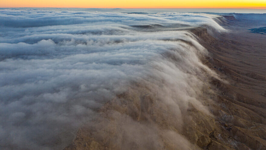Clouds over Mitzpe Ramon, the Ramon Crater, a geological feature in Israel's Negev Desert, early on Aug. 21, 2020. Photo by Edi Israel/Flash90.