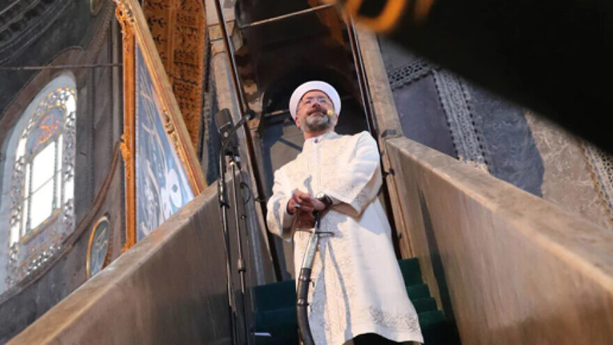 Turkey’s top Muslim cleric, professor Ali Erbaş, holds a sword on his way to deliver a Friday sermon the Hagia Sophia mosque in Istanbul on July 24, 2020. Credit: MEMRI.