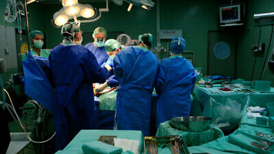 Israeli surgeons and nurses conduct open-heart surgery in an Israeli hospital on Jan. 15, 2007. Photo by Nati Shohat/Flash90.